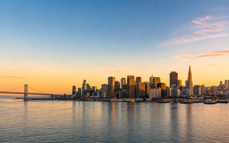 San Francisco skyline with bay bridge at sunset